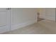 Plush bedroom with white walls, carpet, and open doors leading to other areas at 64 Lakeview Pt, Dallas, GA 30157