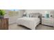 Calm bedroom with a large window, comfortable bed, and stylish nightstands at 64 Lakeview Pt, Dallas, GA 30157
