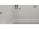 Laundry room with tile flooring at 64 Lakeview Pt, Dallas, GA 30157