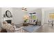 Cozy living room with fireplace, comfortable seating, and ample natural light at 64 Lakeview Pt, Dallas, GA 30157