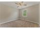 Bedroom featuring neutral colors, ceiling fan, and carpet at 708 Wind Song Trce, Woodstock, GA 30189