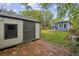 Backyard shed on a brick pad, near a patio, with the house in the background at 1211 Mortimer Se Pl, Atlanta, GA 30317