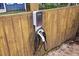 Electric car charging station on the back fence is ready for use at 1211 Mortimer Se Pl, Atlanta, GA 30317