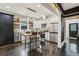 Spacious kitchen with stainless steel appliances, pendant lighting, and dark hardwood floors at 1211 Mortimer Se Pl, Atlanta, GA 30317