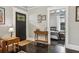 Bright living room flows into bedroom and features an entryway with a sleek console table at 1211 Mortimer Se Pl, Atlanta, GA 30317