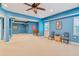 Spacious finished basement with plush carpet, recreational spaces, and ample room for relaxation and entertainment at 1316 Wind Chime Ct, Lawrenceville, GA 30045