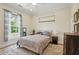 Cozy bedroom with natural light, neutral walls and furnishings, and plush carpeting at 2610 Cheney St, Atlanta, GA 30344