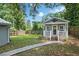 Backyard with a well maintained lawn and a cozy ' Shed' at 2610 Cheney St, East Point, GA 30344