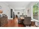Cozy dining area with stylish furnishings and a view of the modern kitchen and abundant natural light at 2610 Cheney St, East Point, GA 30344