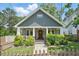 Charming craftsman home with a welcoming front porch and meticulously landscaped front yard at 2610 Cheney St, East Point, GA 30344