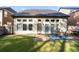 The home has a spacious backyard with patio and manicured lawn at 2800 Tuscany Park Dr, Lawrenceville, GA 30043