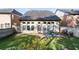 View of the home's backyard with a lawn, fence, and patio area at 2800 Tuscany Park Dr, Lawrenceville, GA 30043