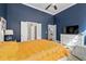 Spacious bedroom features a large bed, TV, and multiple entryways, offering both comfort and convenience at 2800 Tuscany Park Dr, Lawrenceville, GA 30043