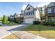 Pleasant two-story brick home with a well-kept lawn, neat landscaping, and an attached two-car garage at 2800 Tuscany Park Dr, Lawrenceville, GA 30043