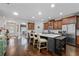 Bright, spacious kitchen with a large island, white countertop, and wooden floors at 2800 Tuscany Park Dr, Lawrenceville, GA 30043