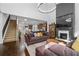 Open floor plan featuring a spacious living room connected to a modern kitchen at 2800 Tuscany Park Dr, Lawrenceville, GA 30043