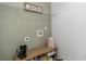 Efficient mud room with shoe storage, a bench, and overhead shelving at 2800 Tuscany Park Dr, Lawrenceville, GA 30043