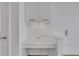 Stylish built-in desk area with overhead cabinets and sleek countertop at 3324 Peachtree Ne Rd # 2004, Atlanta, GA 30326