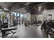 Community fitness center with modern weight training equipment and mirrors at 3324 Peachtree Ne Rd # 2004, Atlanta, GA 30326