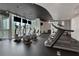 Community gym with cardio equipment overlooking an outdoor cityscape at 3324 Peachtree Ne Rd # 2004, Atlanta, GA 30326