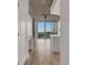 Bright living room with modern flooring, city views, and a built-in desk area at 3324 Peachtree Ne Rd # 2004, Atlanta, GA 30326