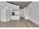 Open-concept living space featuring sleek flooring and modern fixtures at 3324 Peachtree Ne Rd # 2004, Atlanta, GA 30326