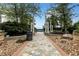 Relaxing outdoor lounge with stone walkway, lush landscaping and city views at 3324 Peachtree Ne Rd # 2004, Atlanta, GA 30326
