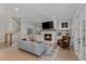 Cozy living room features a fireplace, built-in shelving, hardwood floors, and a comfortable seating area at 357 Mell Ave, Atlanta, GA 30307