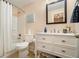 Well-lit bathroom features a vanity with storage and a shower-tub combination, offering convenience and style at 1126 Francis Ne St, Atlanta, GA 30319