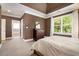 Serene bedroom featuring neutral colors, plush carpet and a large bright window at 1126 Francis Ne St, Atlanta, GA 30319