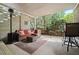 Covered patio with comfortable seating and an outdoor heater, perfect for year-round enjoyment at 1126 Francis Ne St, Atlanta, GA 30319