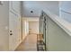 Entryway featuring a hardwood floor, coat rack, and neutral paint, creating a welcoming atmosphere at 1171 Pine Acre Dr, Sugar Hill, GA 30518