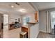Kitchen featuring an island, granite countertops, stainless steel appliances, and breakfast bar at 1171 Pine Acre Dr, Sugar Hill, GA 30518