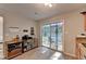 Cozy eat-in kitchen with stainless steel appliances and sliding glass doors to the backyard at 1171 Pine Acre Dr, Sugar Hill, GA 30518