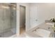 Modern bathroom features a glass-enclosed shower, double vanity, and contemporary fixtures at 408 Niles Ct, Marietta, GA 30060