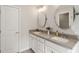 Elegant bathroom featuring a double vanity, ample lighting, and modern finishes at 408 Niles Ct, Marietta, GA 30060