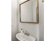 Bathroom featuring a single sink, framed mirror, and modern fixtures at 408 Niles Ct, Marietta, GA 30060