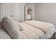 Comfortable bedroom featuring a bed and lots of pillows at 408 Niles Ct, Marietta, GA 30060