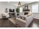 Comfortable living room featuring hardwood floors, fireplace, and natural light that creates an inviting space to relax at 408 Niles Ct, Marietta, GA 30060