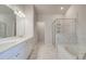 Elegant bathroom with double vanity, soaking tub, and glass-enclosed shower featuring modern finishes at 600 Sidney Ct, Stockbridge, GA 30281