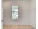 Spacious walk-in closet with window and wire shelving for optimal storage and organization at 600 Sidney Ct, Stockbridge, GA 30281