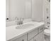 Modern bathroom features a toilet, sink and a tiled shower and bath at 1005 Coleman Place Dr, Roswell, GA 30075