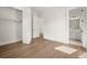 Clean bedroom includes a closet and access to an ensuite bathroom at 1005 Coleman Place Dr, Roswell, GA 30075