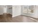 Walk-in closet with wooden floors, shelving, and windows for ample natural light at 1005 Coleman Place Dr, Roswell, GA 30075