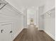 Spacious walk-in closet with hardwood floors and ample shelving at 1005 Coleman Place Dr, Roswell, GA 30075