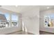 Spacious walk-in closet featuring natural lighting and hanging shelfs at 1005 Coleman Place Dr, Roswell, GA 30075