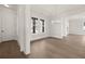 Dining room area featuring hardwood flooring, recessed lighting, and chandelier at 1005 Coleman Place Dr, Roswell, GA 30075