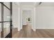 Bright entryway featuring hardwood floors and white trim at 1005 Coleman Place Dr, Roswell, GA 30075