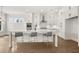 Spacious kitchen with white cabinets, stainless steel appliances, and a center island at 1005 Coleman Place Dr, Roswell, GA 30075