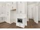 Stylish, modern kitchen featuring white cabinets, stainless steel appliances, and sleek finishes at 1005 Coleman Place Dr, Roswell, GA 30075